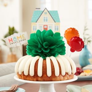 Just Because Thinking of You cake with home cutout in the background