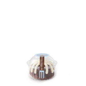Bundtlet with frosting petals in plastic container
