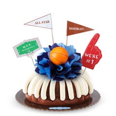 Large cake with foam finger reading "We're #1" and a basketball in the center. 
