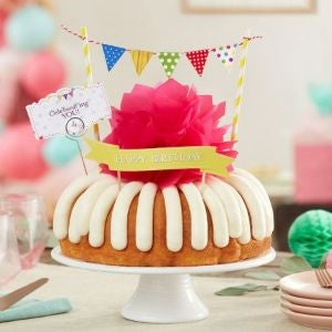 Thinking of You Thinking of You cake with hot pink bow and celebratory banner