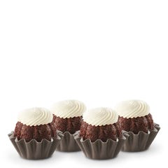 Chocolate Chocolate Chip flavored mini bundt cakes topped with a cream cheese frosting swirl.