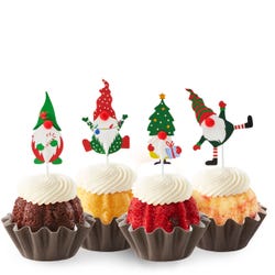 Holiday Gnome Bundtinis&reg; topped with frosting and decorated with Christmas themed gnomes.
