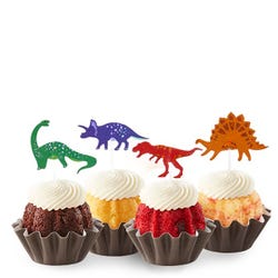 Bundtinis&reg; topped with frosting and decorated with green, purple, red and orange dinosaurs.