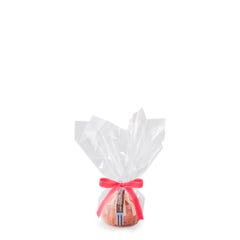 Personal size White Chocolate Raspberry bundt cake, packaged in a plastic container and gift-wrapped in cellophane. 